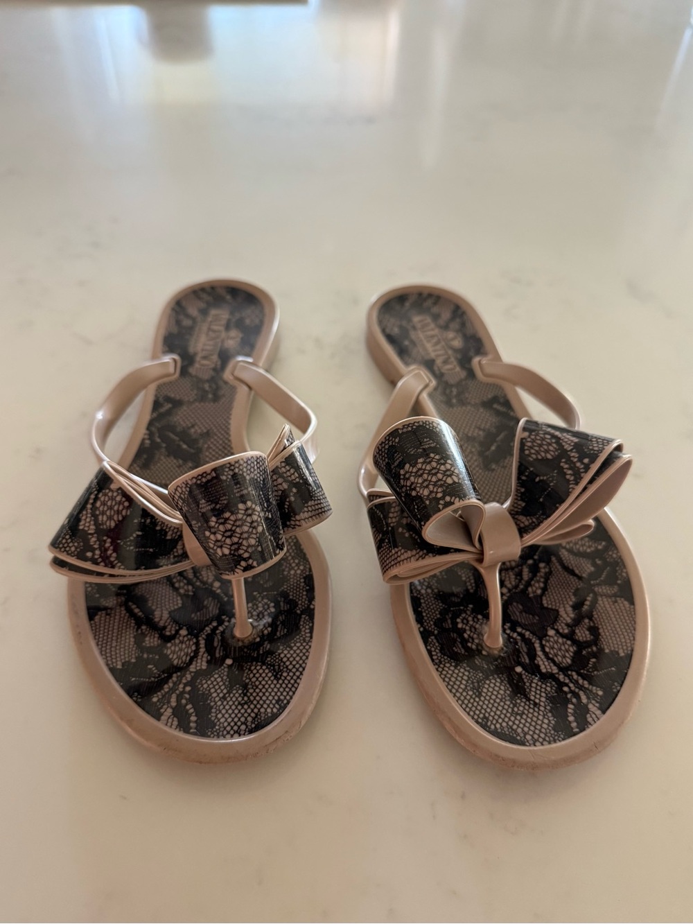 Valentino Garavani Blush Pink Thong Sandals with Black Lace Bow